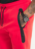 Herren Sweatshorts DOGWOOD POCKET - Fluo Rot